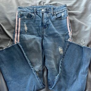 Super cute high rise jeans with two pink stripes running down on each side